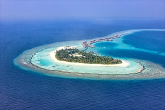 Island holiday paradise sea text free space copyspace Halaveli Resort Ari Atoll aerial photo tourism in the Maldives