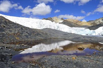 Glacier Pastoruri reflected in the water
