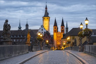 Old bridge over the river Main at dawn