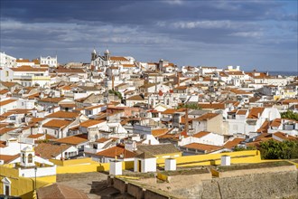 Whitewash architecture of Elvas seen behind fortified walls of the town