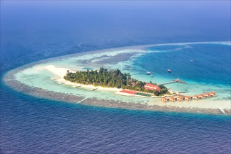 Island holiday paradise sea text free space copyspace Maayafushi Resort Ari Atoll aerial photo tourism in the Maldives
