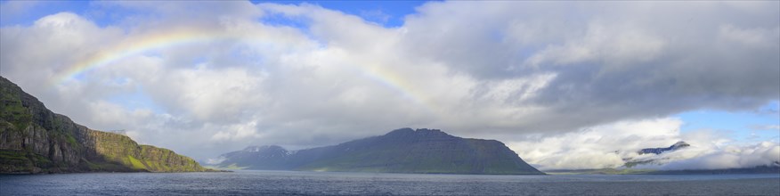 Rainbow at the entrance to the fjord of