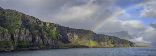Rainbow at the entrance to the fjord of