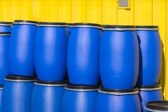 Blue plastic bins for hazardous waste at a recycling centre