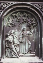 Scenes from the life of Martin Luther on the pedestal of the Luther Monument in Moehra