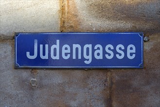 Street sign Judengasse on a house wall