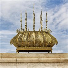 Ornate shiny metal lamp at the mausoleum of King Mohammed V