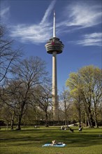 City garden in spring and telecommunications tower Colonius