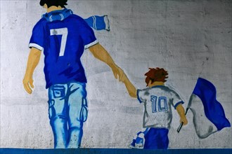 Father and son in Schalke jerseys