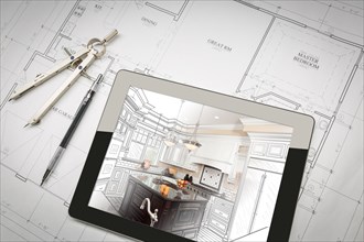 Computer tablet showing kitchen illustration on house plans