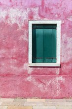 Pink wall with window
