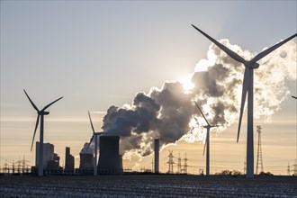 Wind turbines and coal-fired power plant
