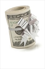Roll of one hundred dollar bills tied in a silver bow on a white background