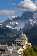Church of Colle Santa Lucia with peak of Monte Pelmo in the background