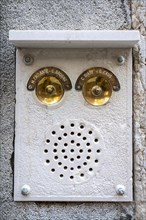 Bell on a house wall