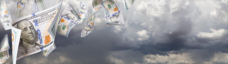 Several 100 dollar bills falling from stormy cloudy sky banner