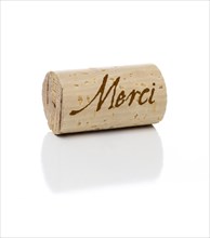 Merci branded wine cork isolated on a white background