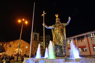 Fountain with monument of the Inca Pachacutec at night