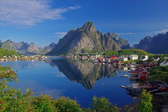 Reinefjord with mountains and village