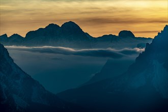 Mountain top of the Dolomites at sunset