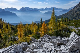 Autumn landscape with mountain peaks of the Dolomites