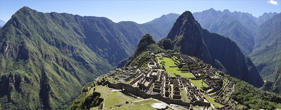 Inca ruined city with Mount Huayna Picchu