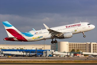 A Eurowings Airbus A320 with the registration D-AEWG takes off from Palma de Majorca Airport