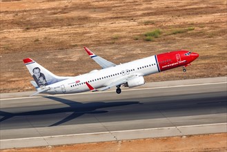 A Norwegian Boeing B737-800 with the registration EI-FHZ and Andre Bjerke on the tail takes off from the airport in Palma de Majorca
