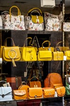 Elegant leather handbags in a shop window