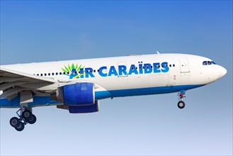 An Air Caraibes Airbus A330-200 with registration F-OFDF lands at Paris Orly airport