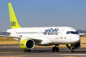 An Air Baltic Airbus A220-300 with the registration YL-CSF at Charles de Gaulle Airport