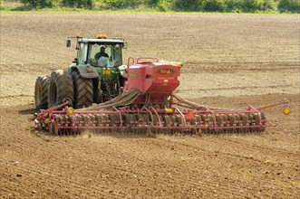 John Deere tractor with Vaderstad Rapid seed drill