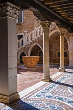 Mosaic floor in the courtyard with columns