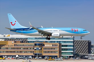 A TUIfly Boeing 737-800 with registration D-ASUN lands at Stuttgart Airport