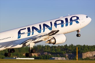 A Finnair Airbus A330-300 with the registration OH-LTP takes off from Helsinki Airport