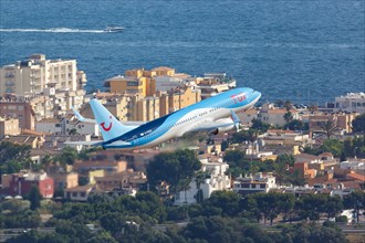 A TUI Boeing B737-800 with the registration G-FDZS takes off from Palma de Majorca Airport