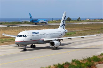 An Airbus A320 aircraft of Aegean Airlines with the registration number SX-DVY at Rhodes airport