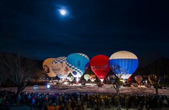Balloon lights on the lakeside during the Montgolfiade 2020 in Bad Wiessee