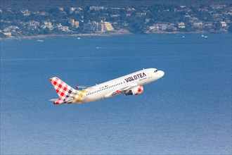 A Volotea Airbus A319 with the registration EC-MUX takes off from Palma de Majorca Airport