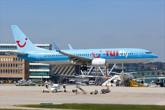 A TUIfly Boeing 737-800 with registration D-ATYC lands at Stuttgart Airport