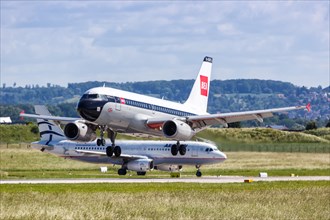 An Airbus A319 aircraft of British Airways with the registration G-EUPJ in the retro special livery lands at Stuttgart Airport