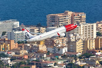 A Norwegian Boeing B737-800 with the registration EI-FHZ and Andre Bjerke on the tail takes off from the airport in Palma de Majorca
