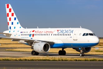 A Croatia Airlines Airbus A319 with registration number 9A-CTL and a Bravo Vatreni sticker for the Croatian national football team at Charles de Gaulle Airport