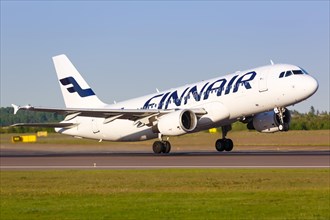 A Finnair Airbus A320 with the registration OH-LXK takes off from Helsinki Airport