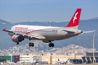 An Air Arabia Maroc Airbus A320 with the registration CN-NML lands at Barcelona Airport