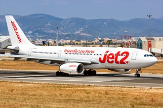 A Jet2 Airbus A330-200 with registration G-VYGL takes off from the airport in Palma de Majorca