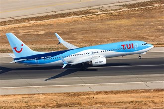 A TUI Boeing B737-800 with the registration G-FDZS takes off from Palma de Majorca Airport
