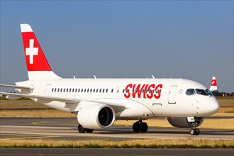 A Swiss Airbus A220-100 with registration HB-JBE at Charles de Gaulle Airport