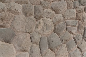 Precise stone setting in flower form of an Inca stone wall