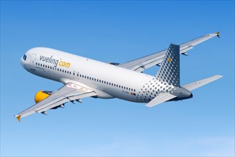 A Vueling Airbus A320 with the registration EC-MAX takes off from Barcelona Airport
